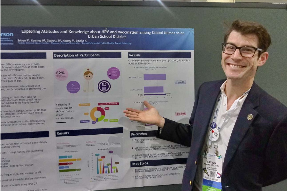 Kearney presenting his poster at APHA